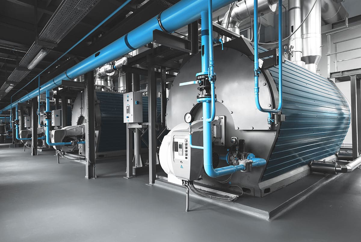 Downloaded Modern industrial gas boiler room equiped for heating process. Heating gas boilers, pipelines, valves.